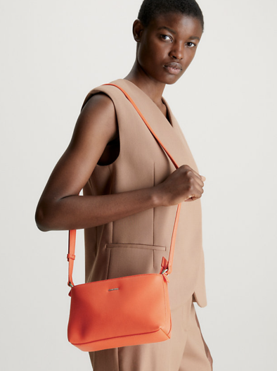 Orange-handback-ladies-organge-sholder-back-CK-Calvin-Klein-.webp.webp.webp
